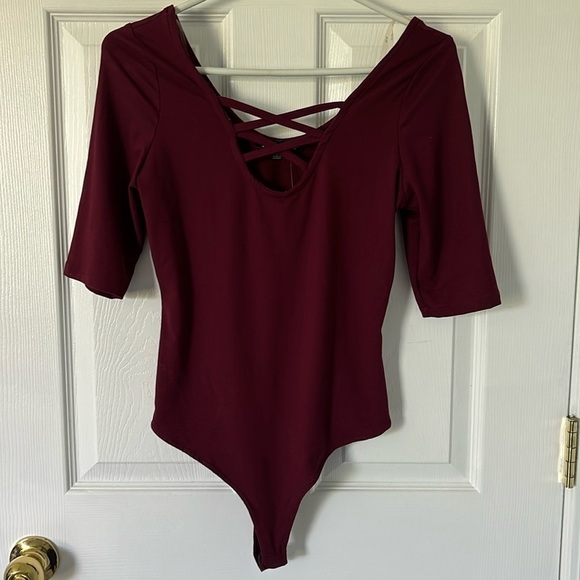 iris Tops - Criss cross bodysuit